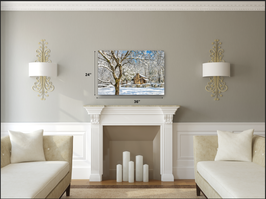 24"x36" metal print winter scene of John Oliver log cabin with snow over a fireplace